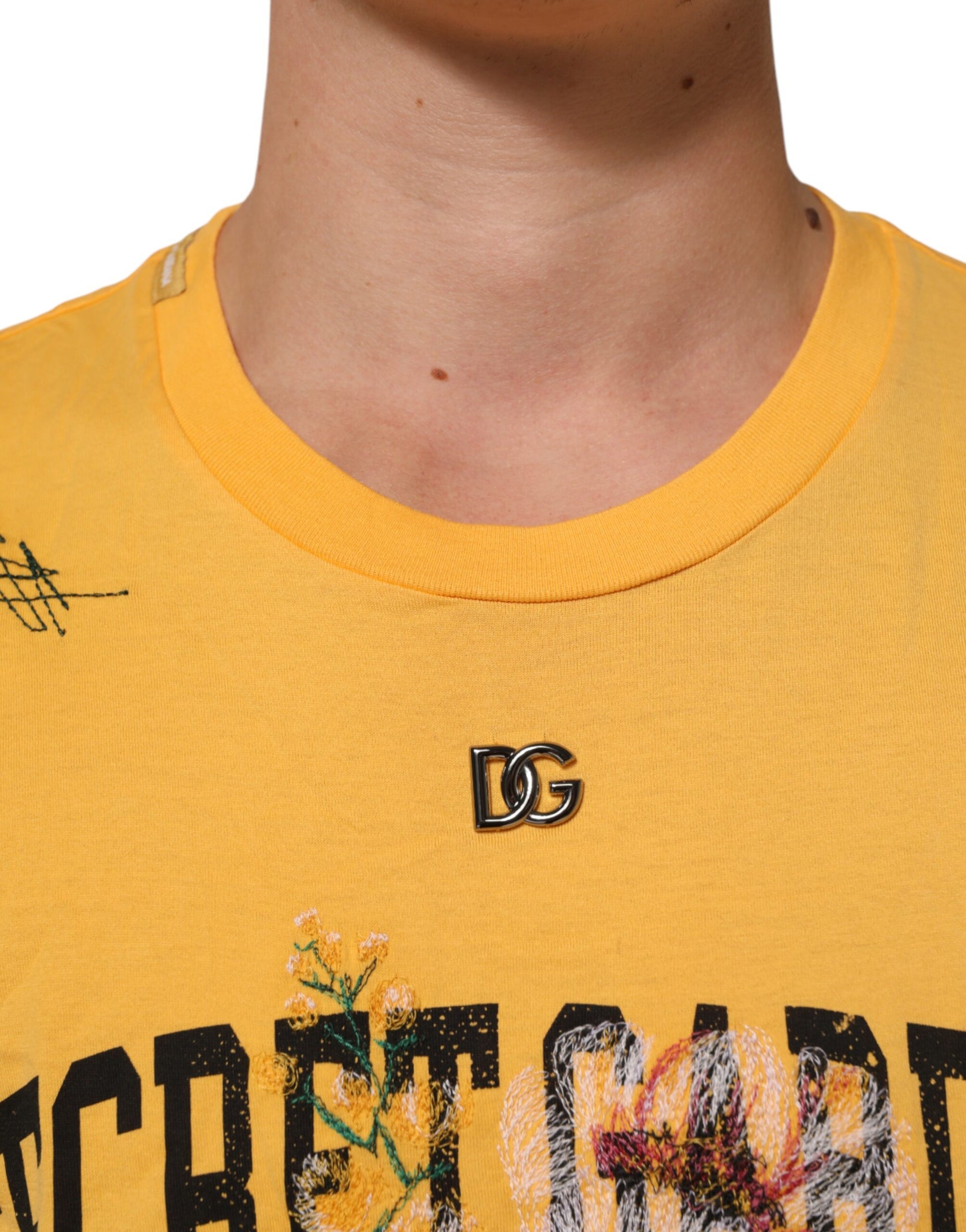 Yellow shirt with black lettering and logo