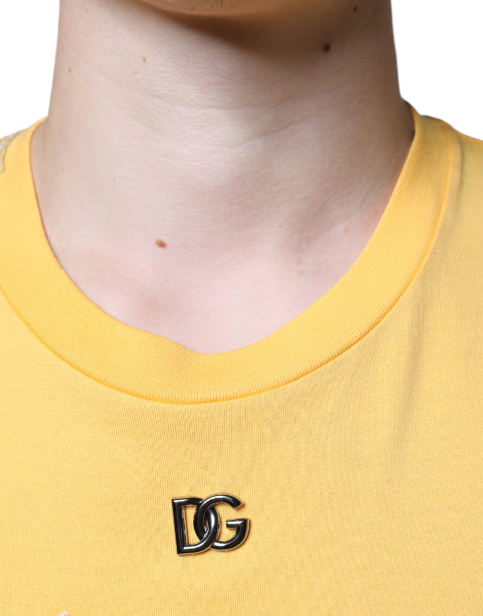 Yellow shirt with black logo on neck