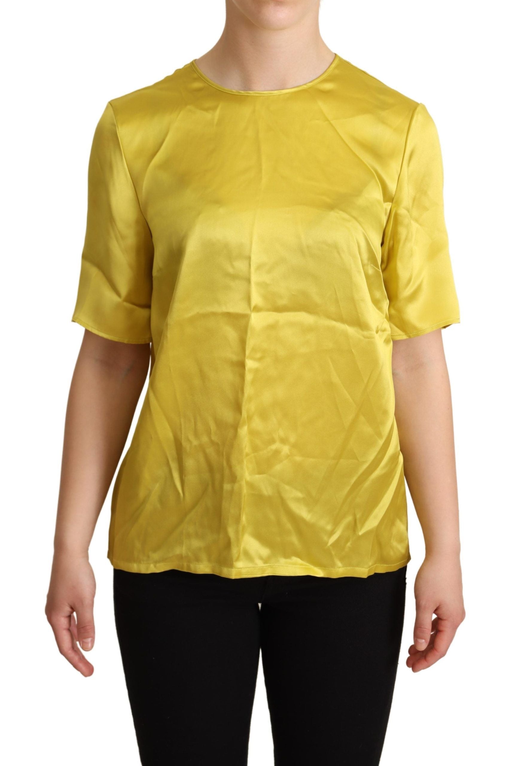 Yellow sleeveless top on woman