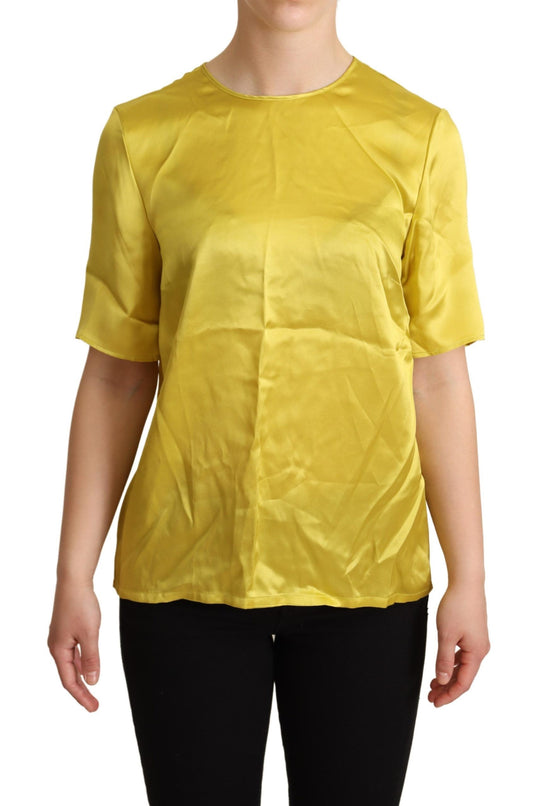 Yellow sleeveless top on woman