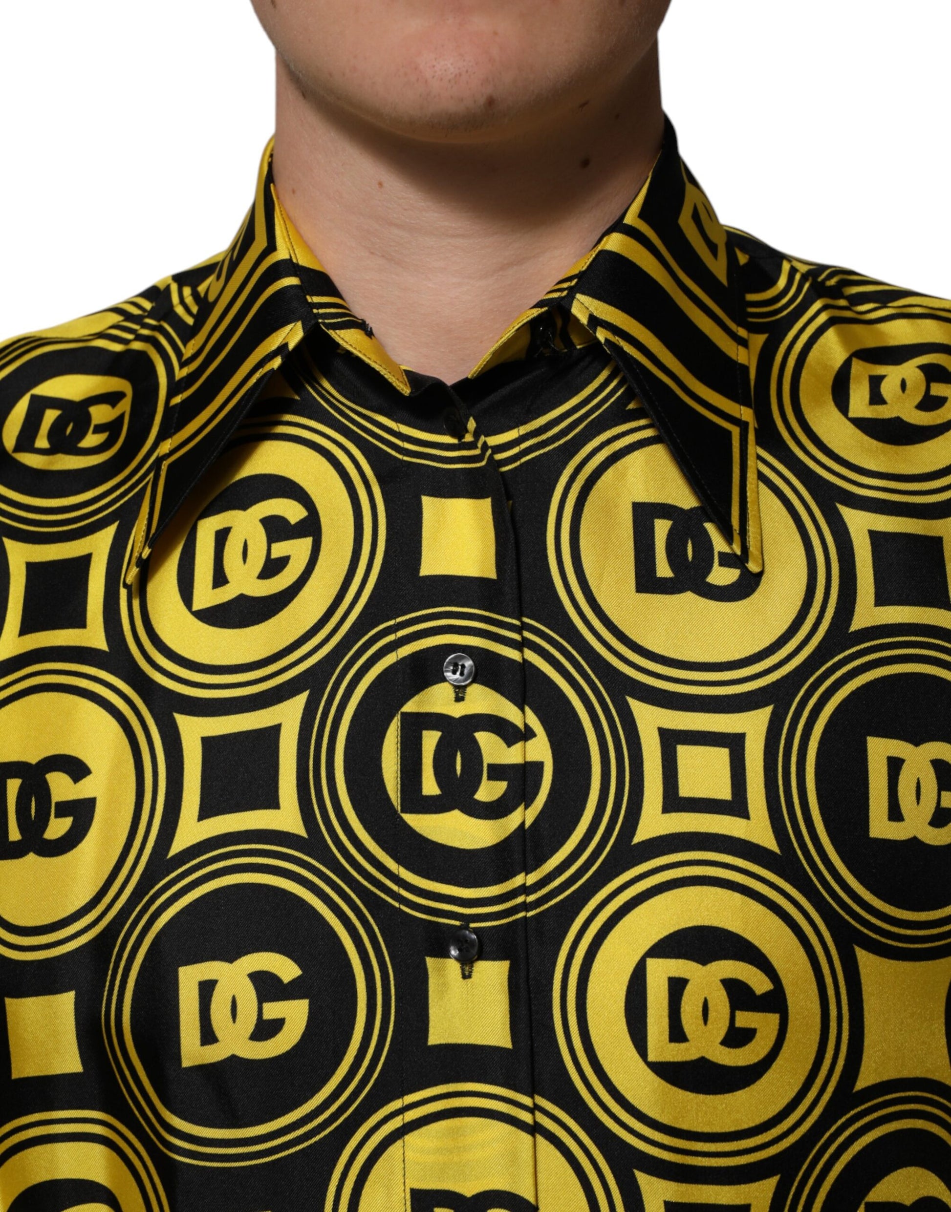 Yellow shirt with yellow circles featuring black letters