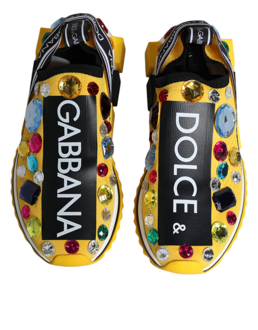 Pair of yellow sneakers with crystal embellishments, featuring the names "Dolce & Gabbana" and "Sorrento"