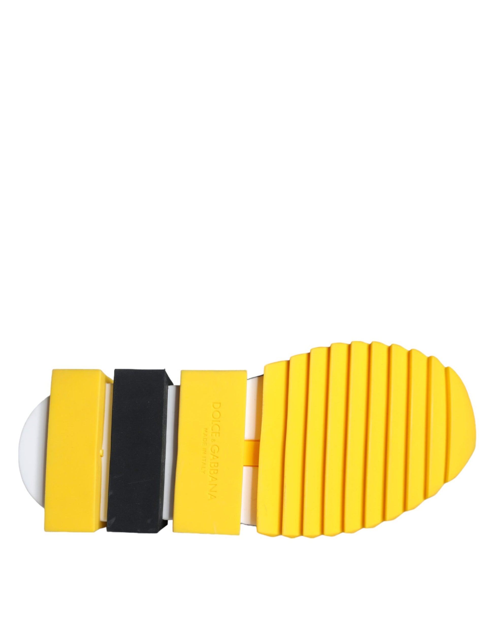 Yellow and black shoe with yellow sole