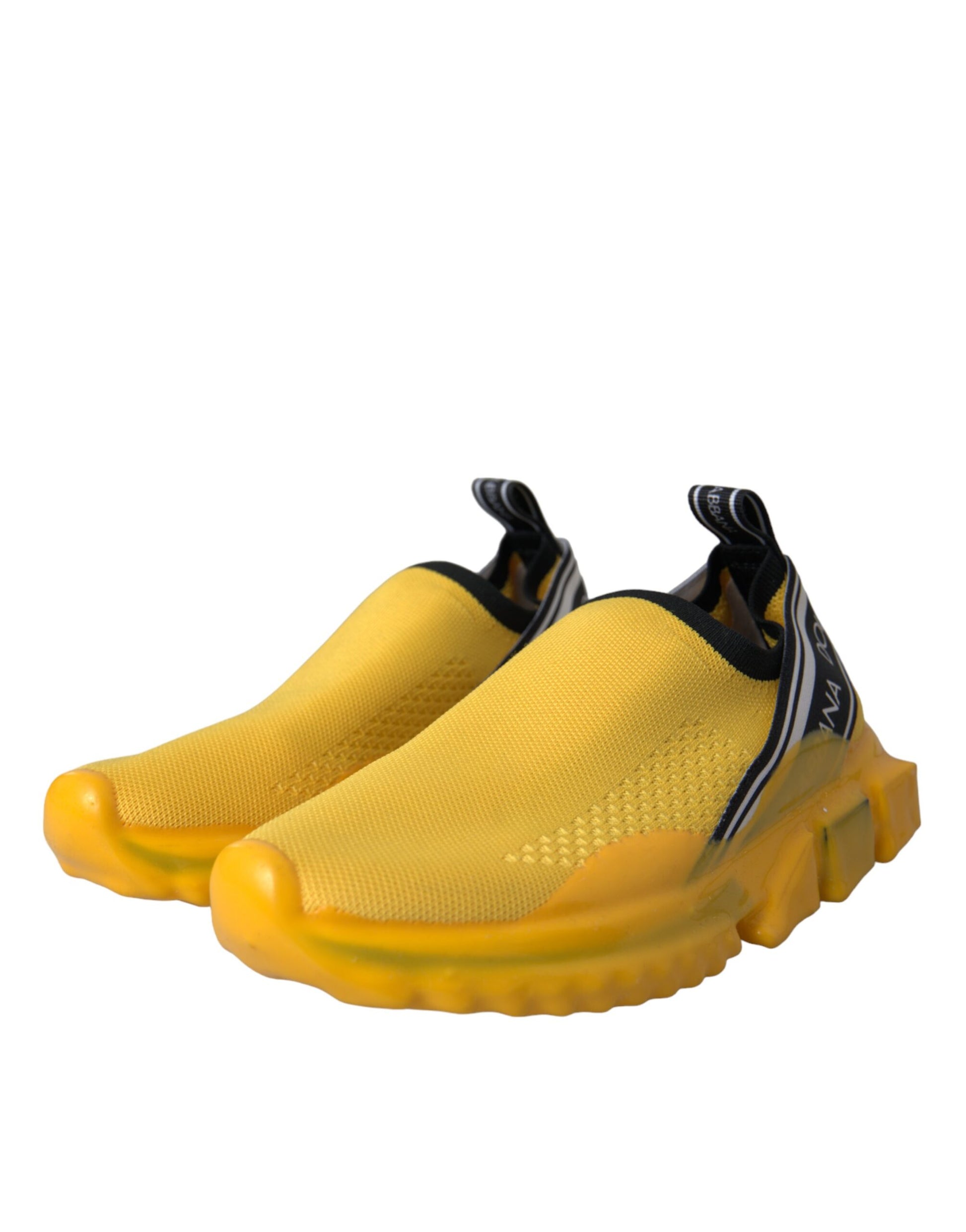 Yellow sneakers with black laces and a black stripe on the side