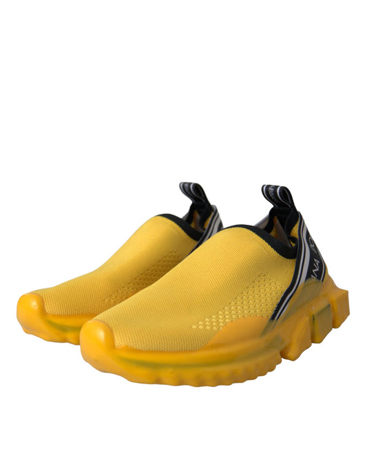 Yellow sneakers with black laces and a black stripe on the side