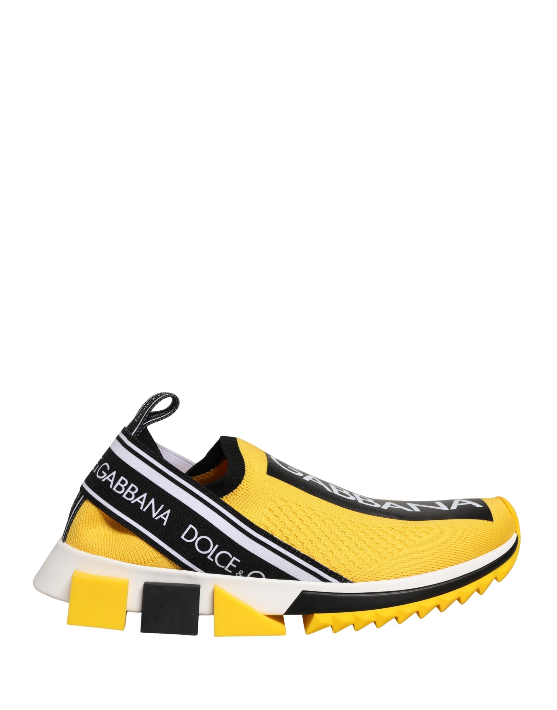 Yellow slip-on shoes with black and white stripes, featuring the Dolce & Gabbana logo