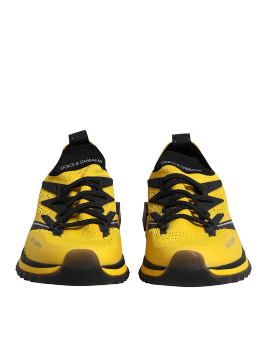 Pair of yellow and black athletic shoes