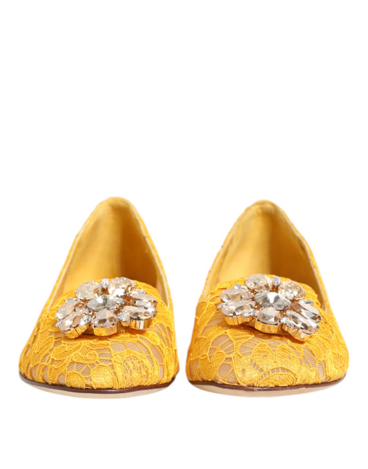 Yellow high heel shoes with embellishments on top