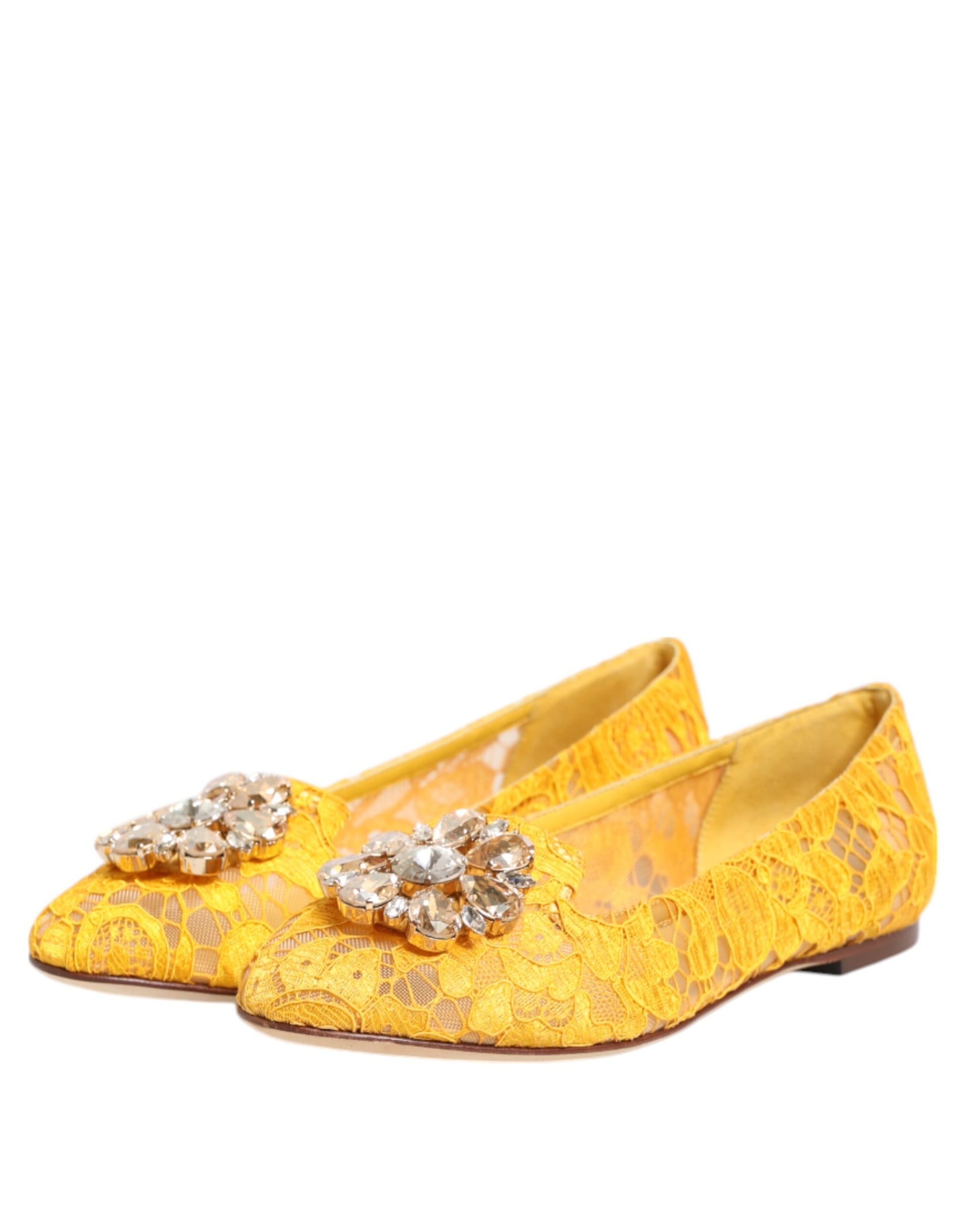 Yellow shoes with embellishments on top