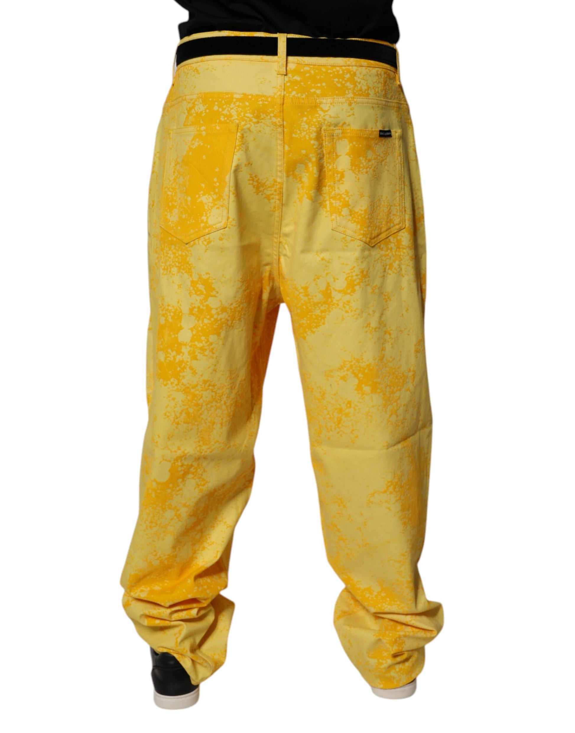 Yellow pants with a pattern on them