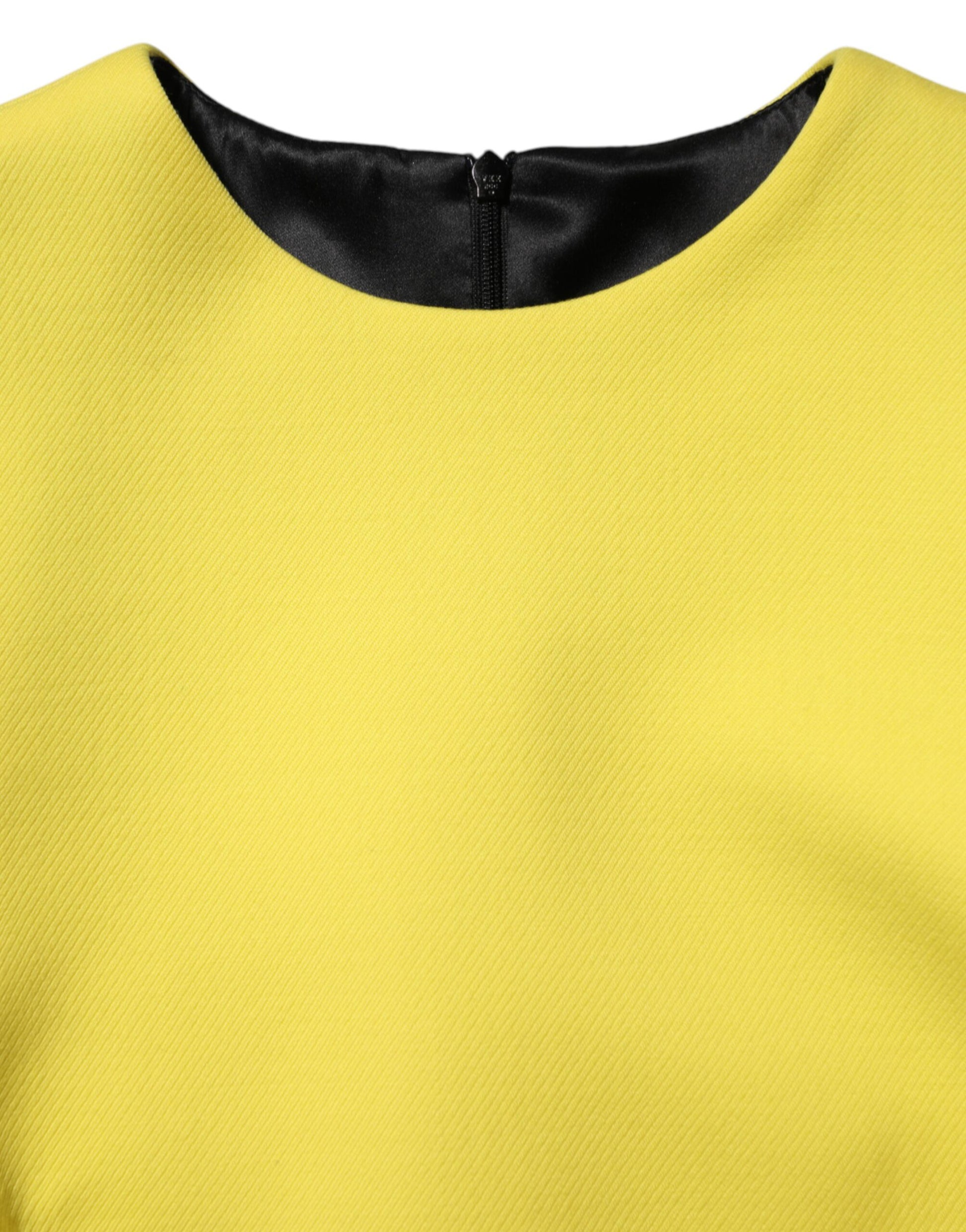 A yellow viscose acetate mini long sleeve dress