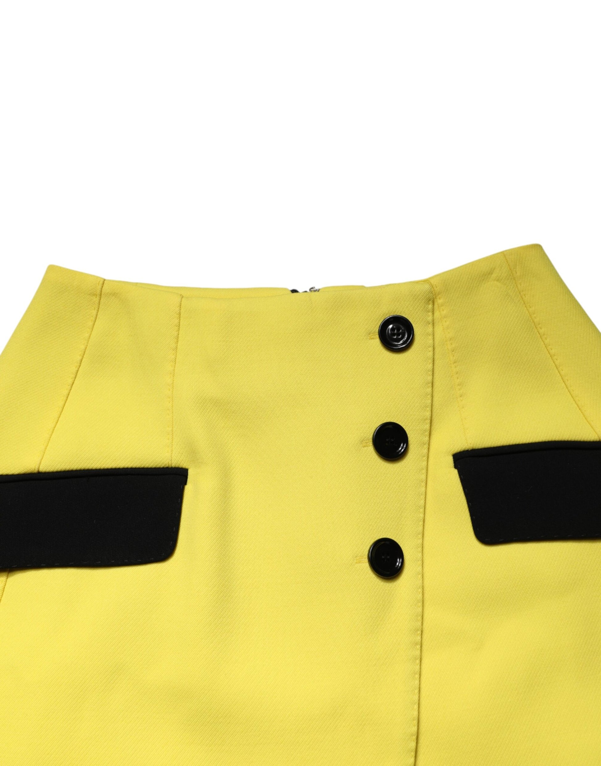 Yellow jacket with black buttons and trim