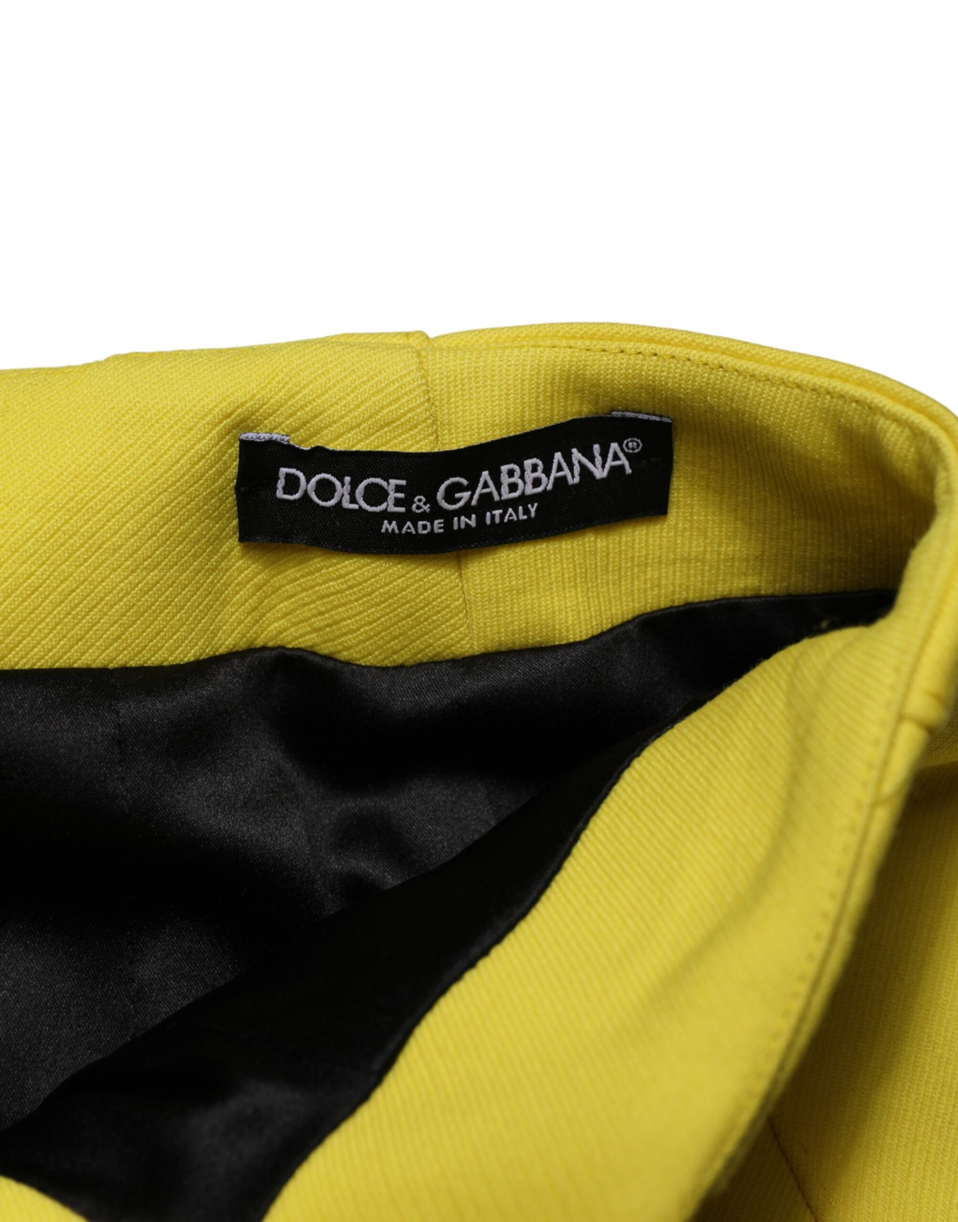 Yellow and black jacket with a label that reads "Dolce & Gabbana"