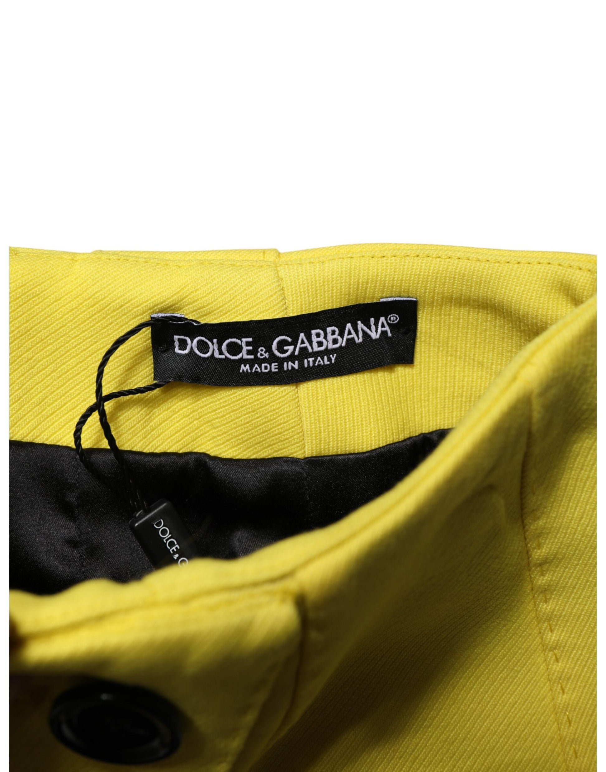Yellow jacket with black label on front