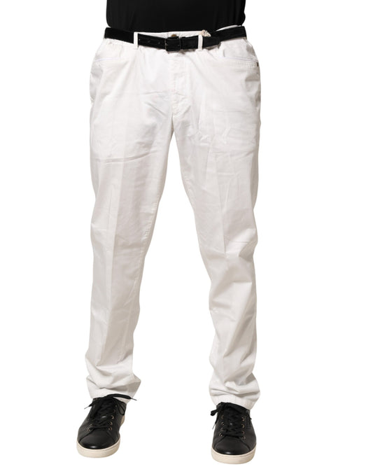 A pair of white tapered dress formal trousers