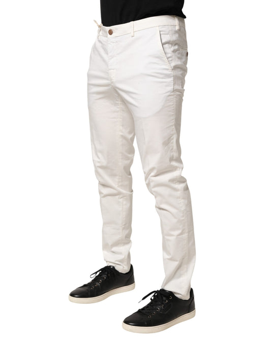 A pair of white tapered dress formal trousers with a slim fit
