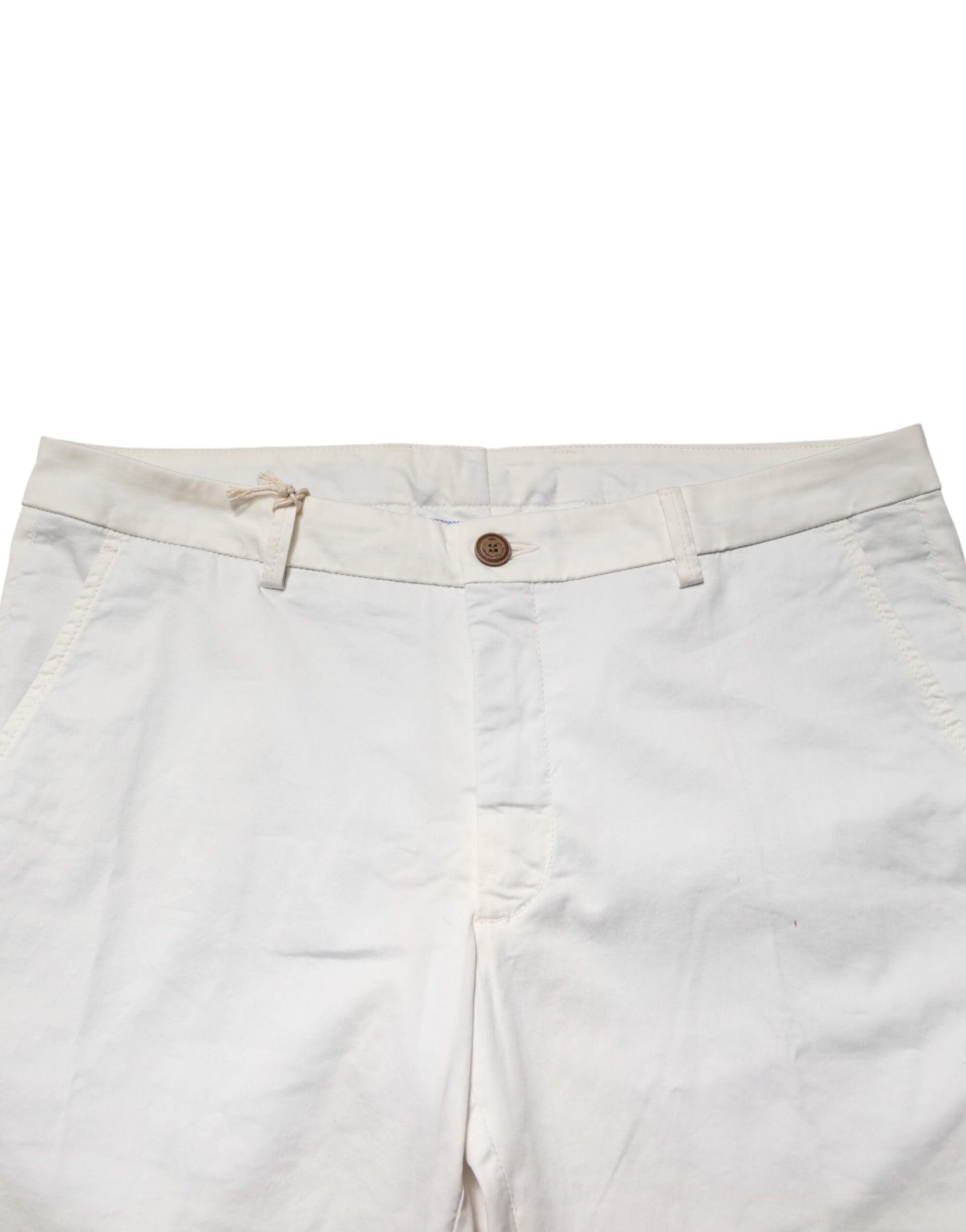 White tapered dress pants with button closure and belt loops