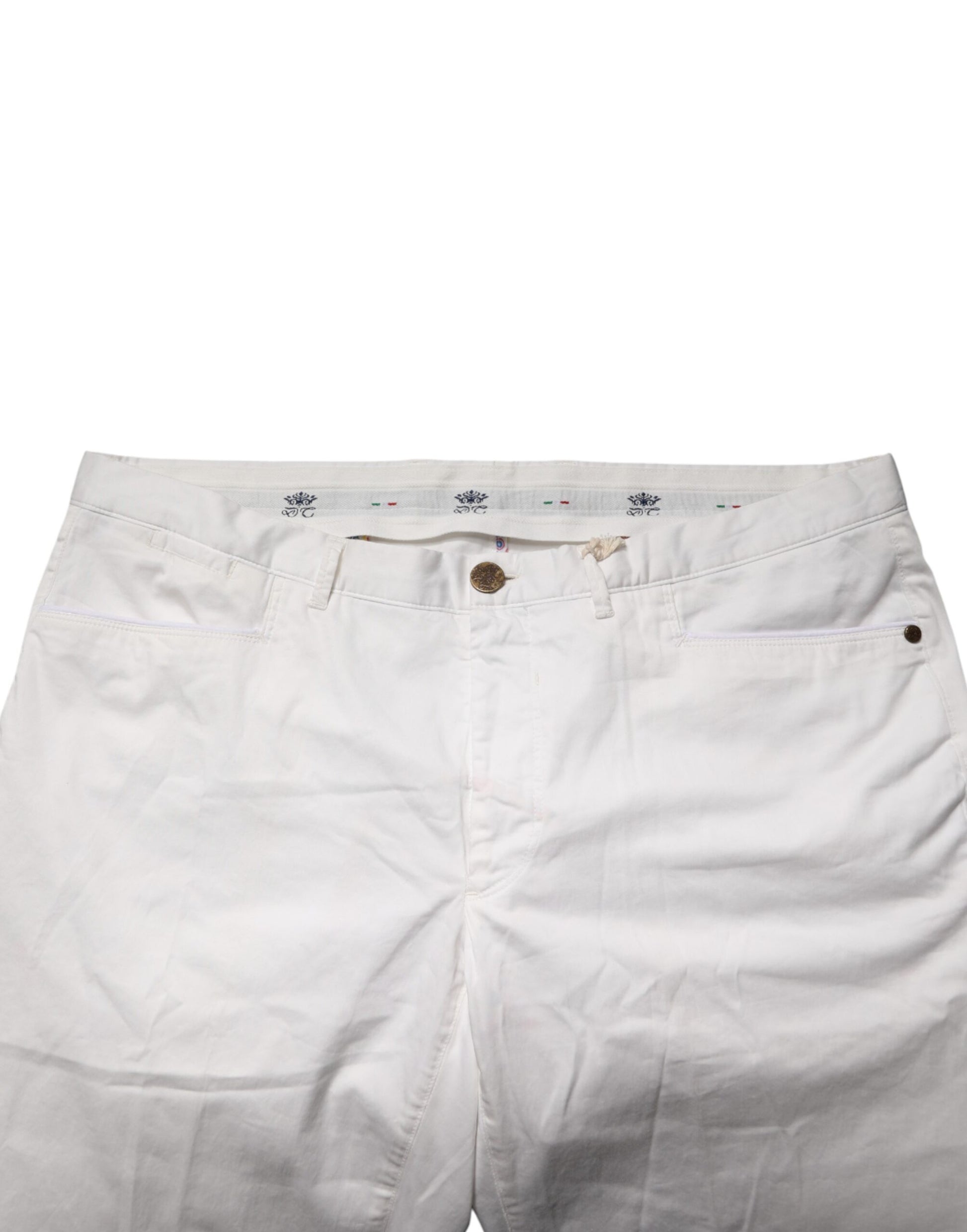 White tapered dress pants with belt loops and pockets