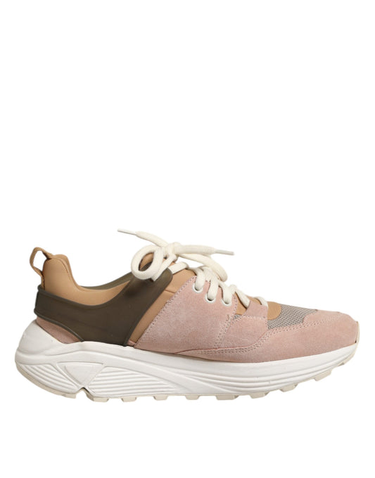 Pink and white sneaker with brown laces
