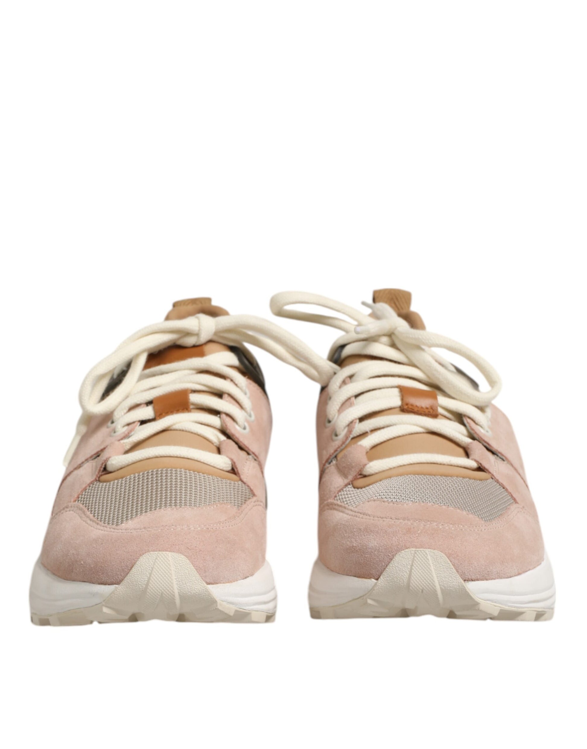 Pair of pink sneakers with white laces