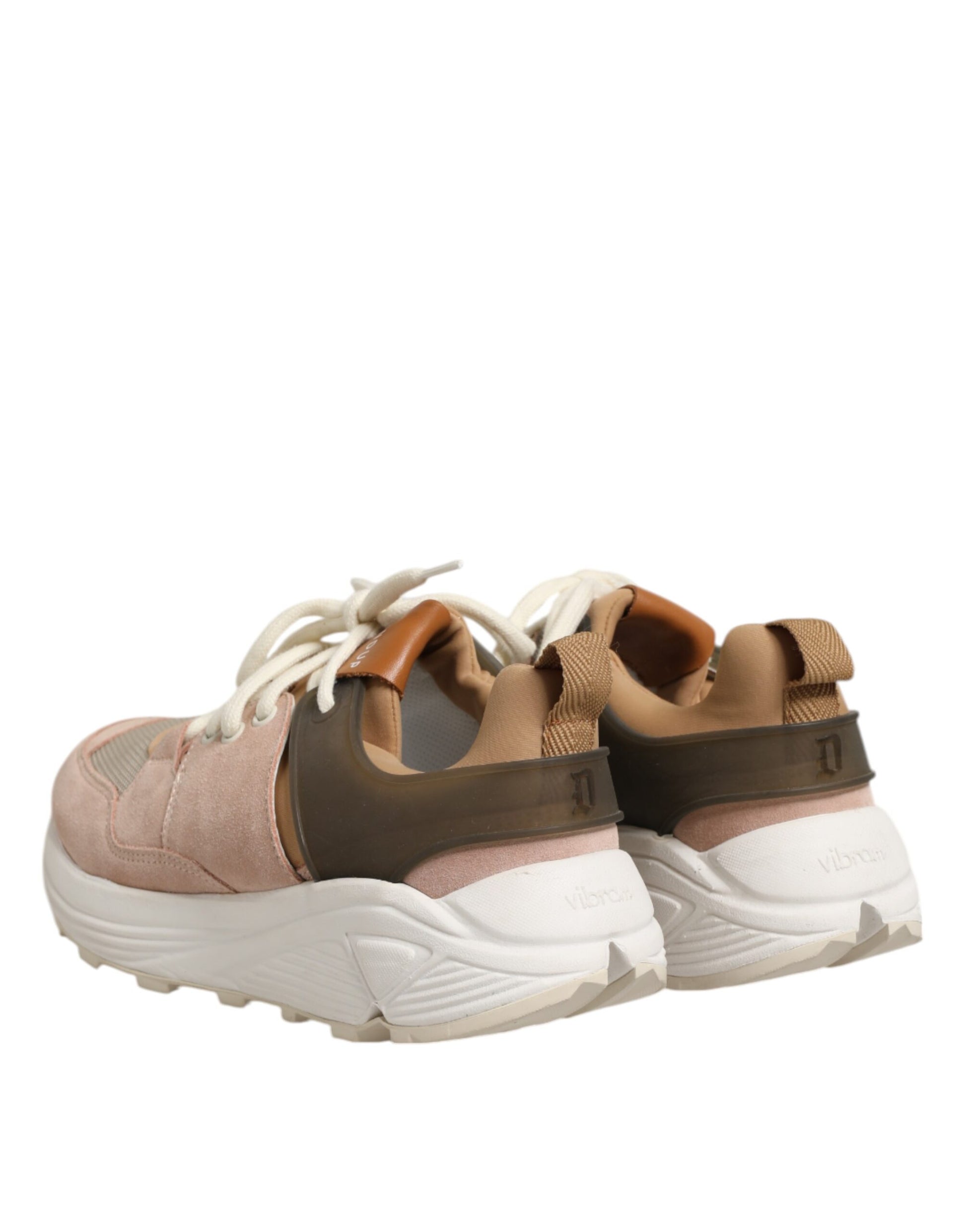 Pair of sneakers with brown laces and a white sole