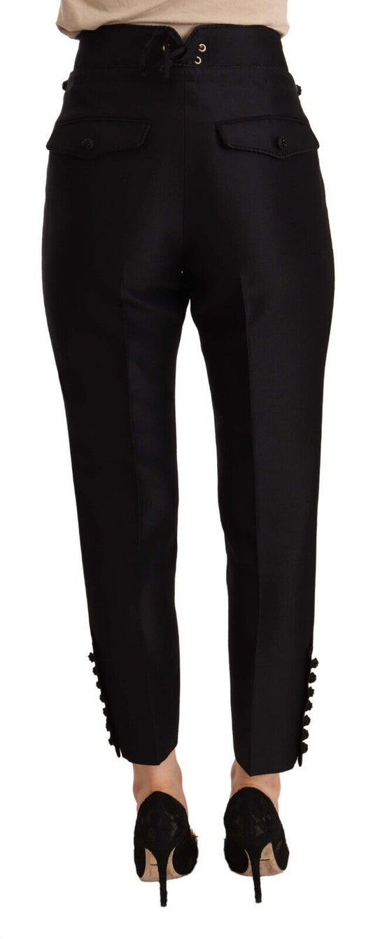 Pair of black trousers with zipper detailing on legs