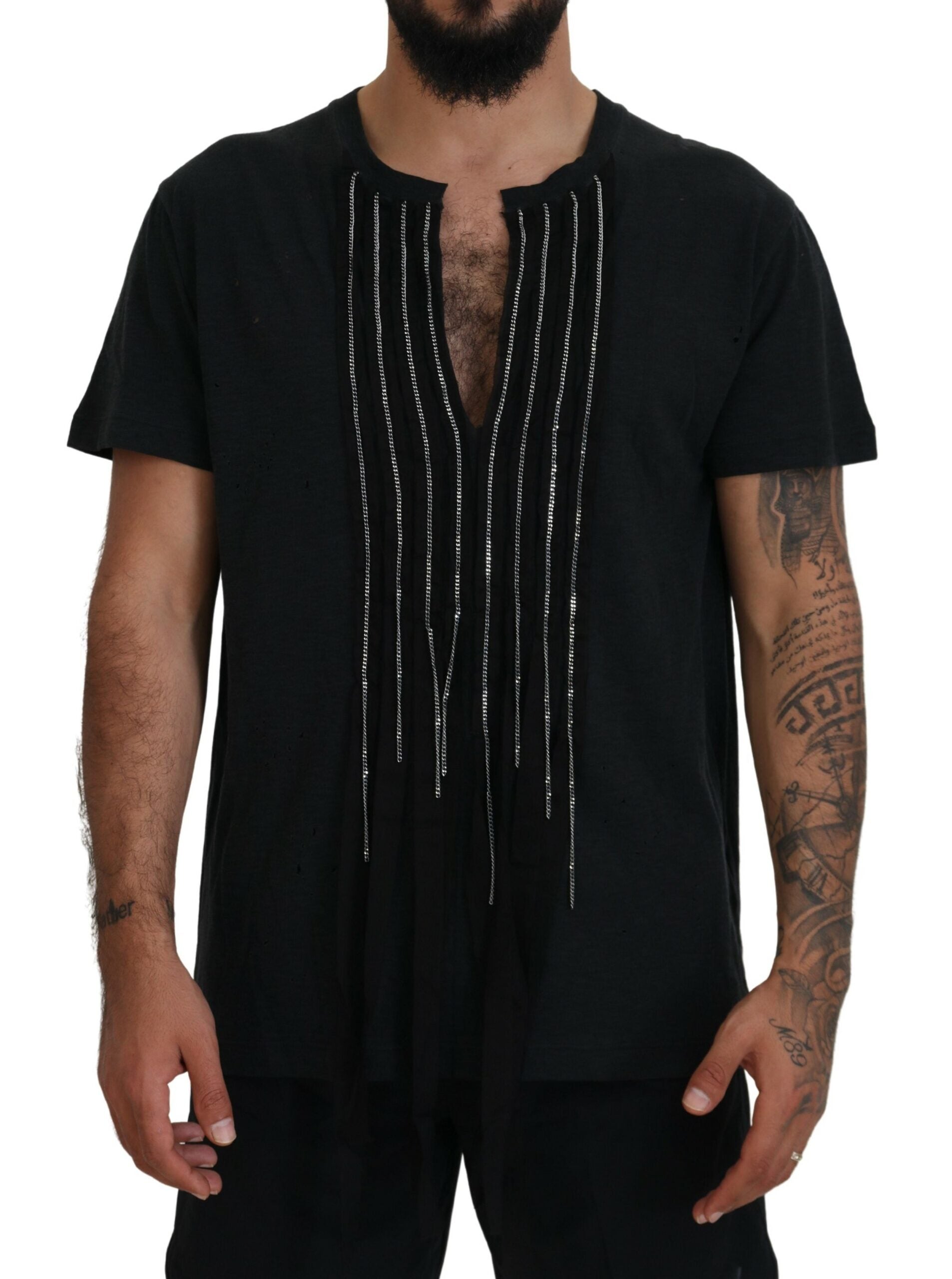 Man wearing black shirt with embroidered design