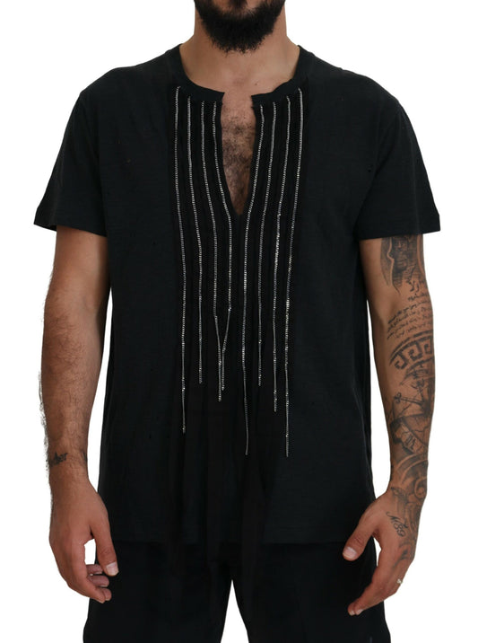 Man wearing black shirt with embroidered design