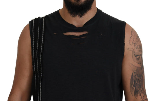 Man wearing black tank top with ripped sleeve and tattoo on arm