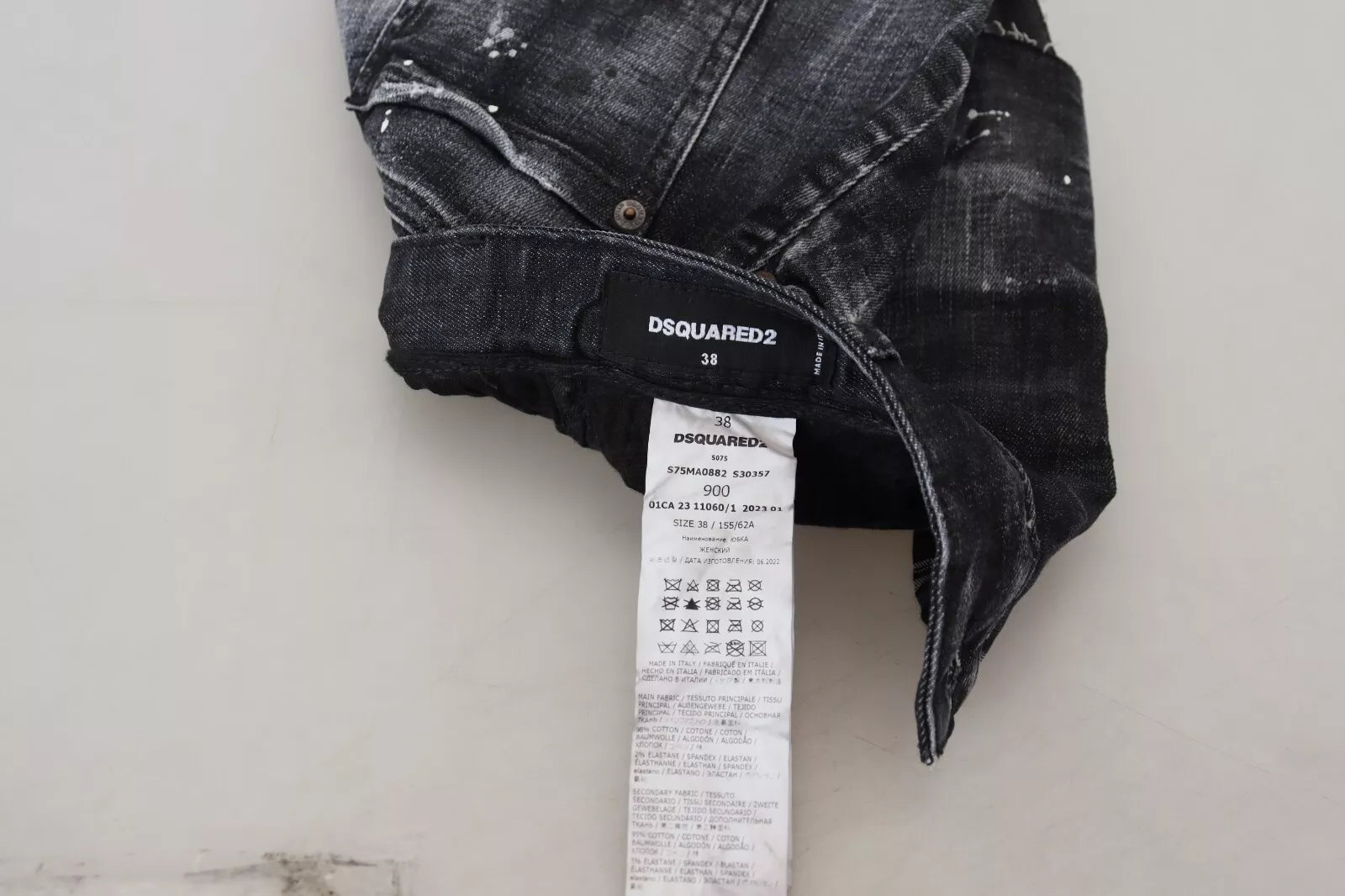 Pair of jeans on a white surface