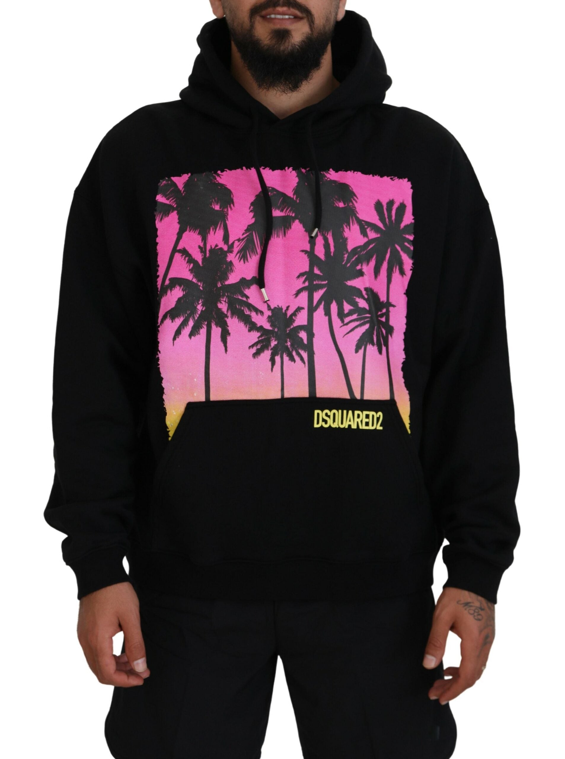 Man wearing black hoodie with pink palm trees on front