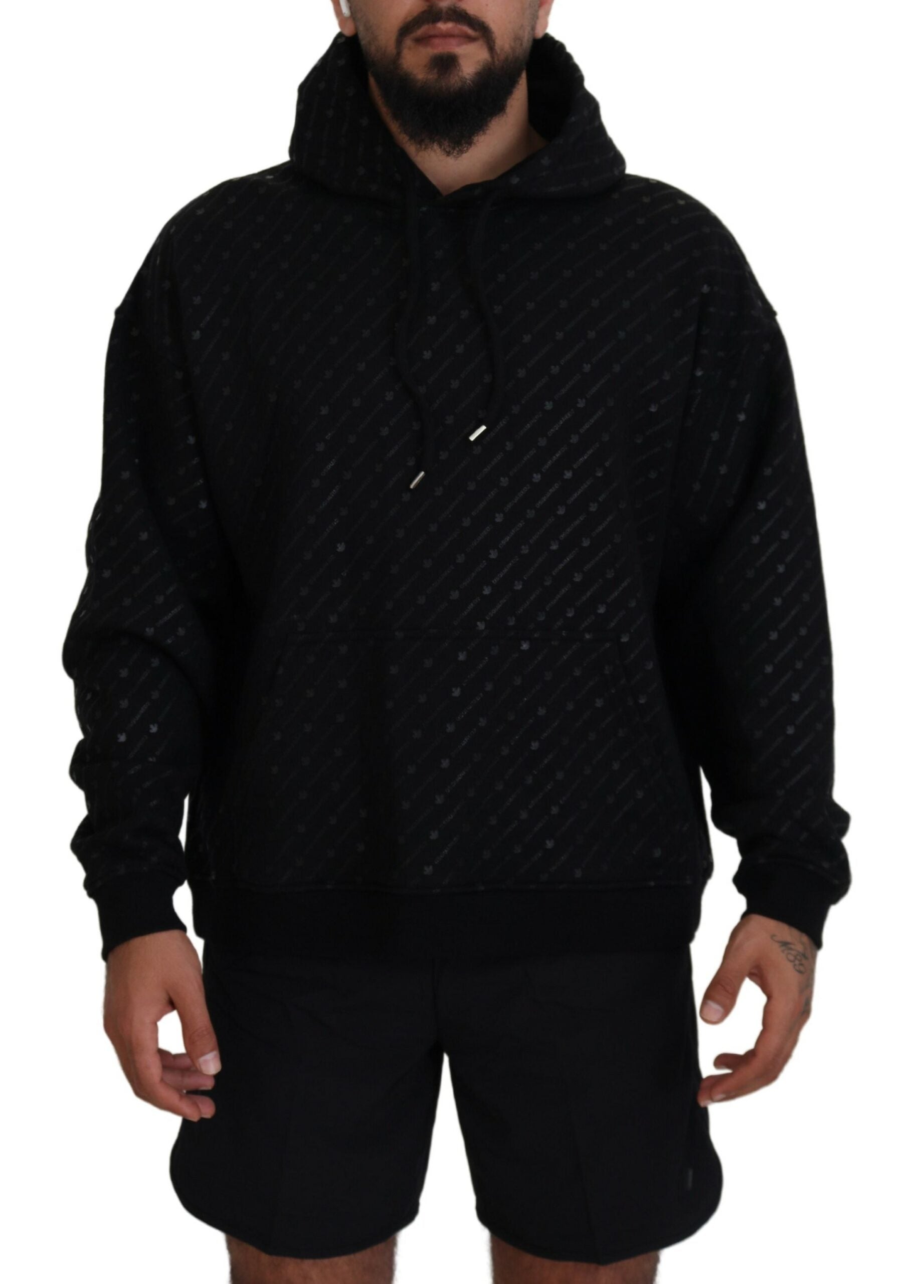 Man wearing black hoodie and shorts