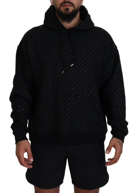 Man wearing black hoodie and shorts