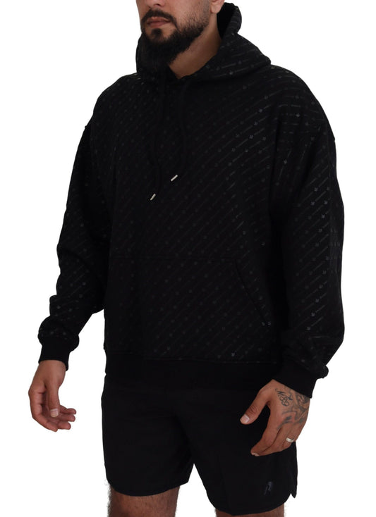 Man wearing black hoodie with camouflage pattern