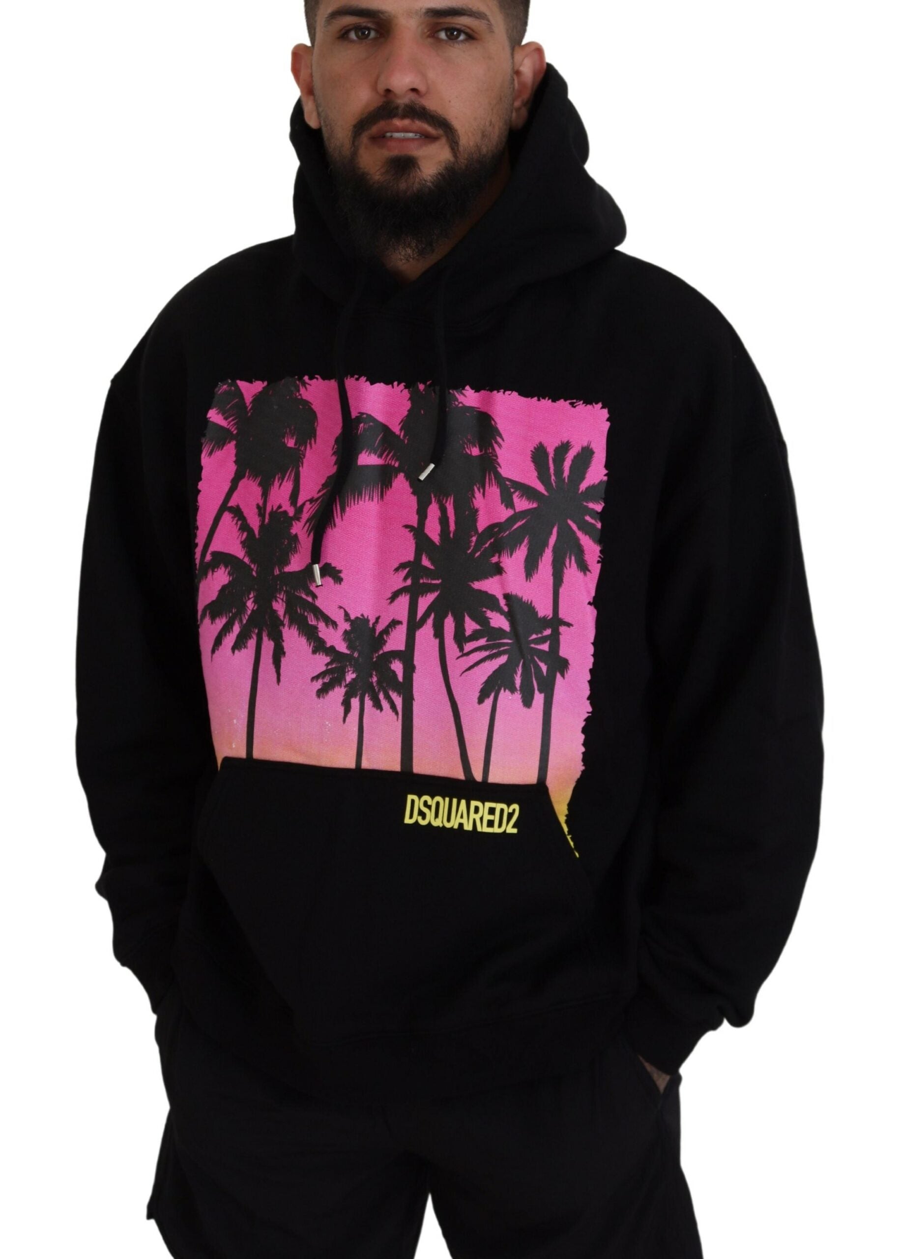 Man wearing black hoodie with palm trees on front