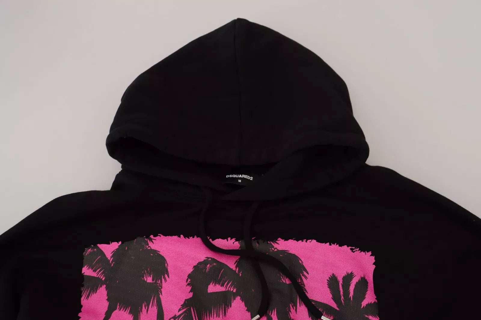 Black hoodie with pink palm trees on front
