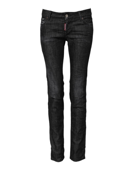 Pair of women's jeans with distressed design and zipper detail on side