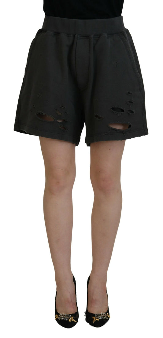 A pair of black tattered shorts with a mid waist