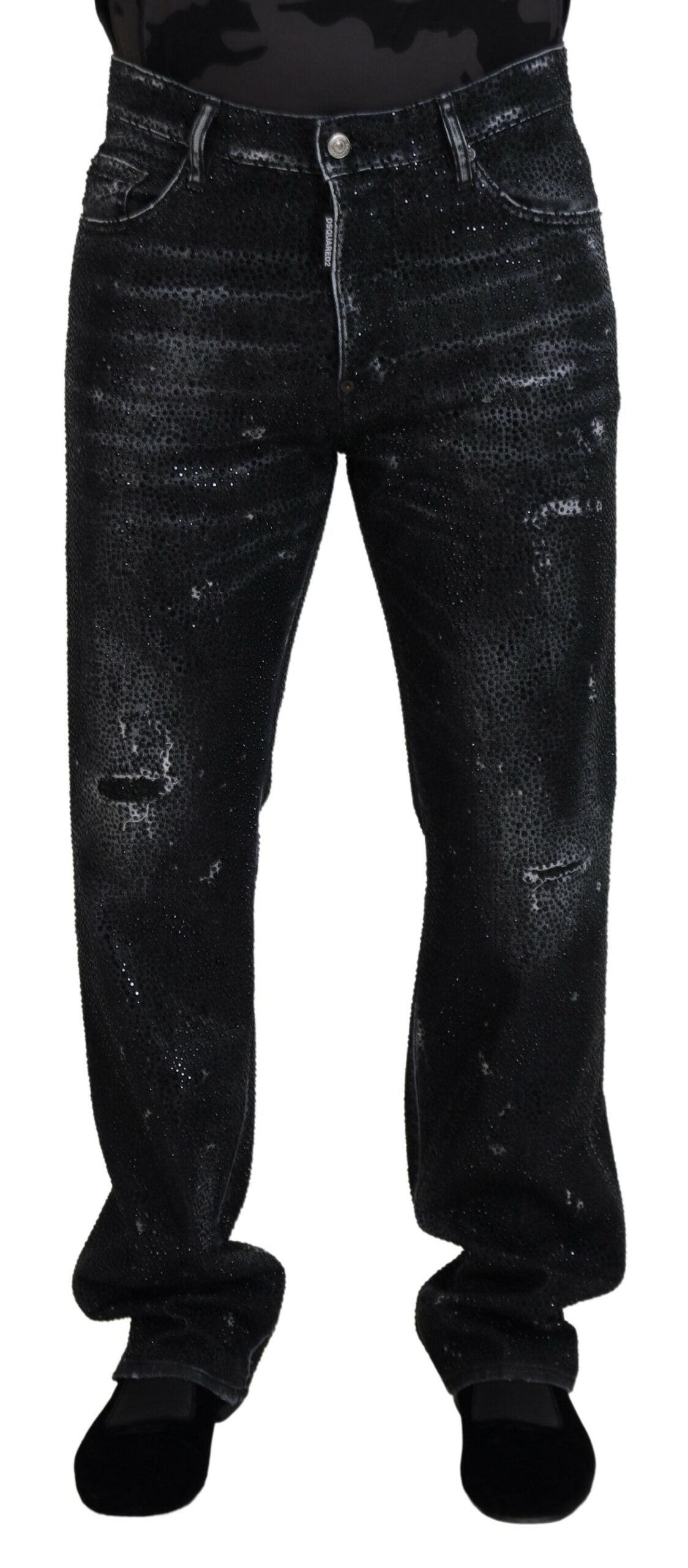 Pair of black jeans with distressed design