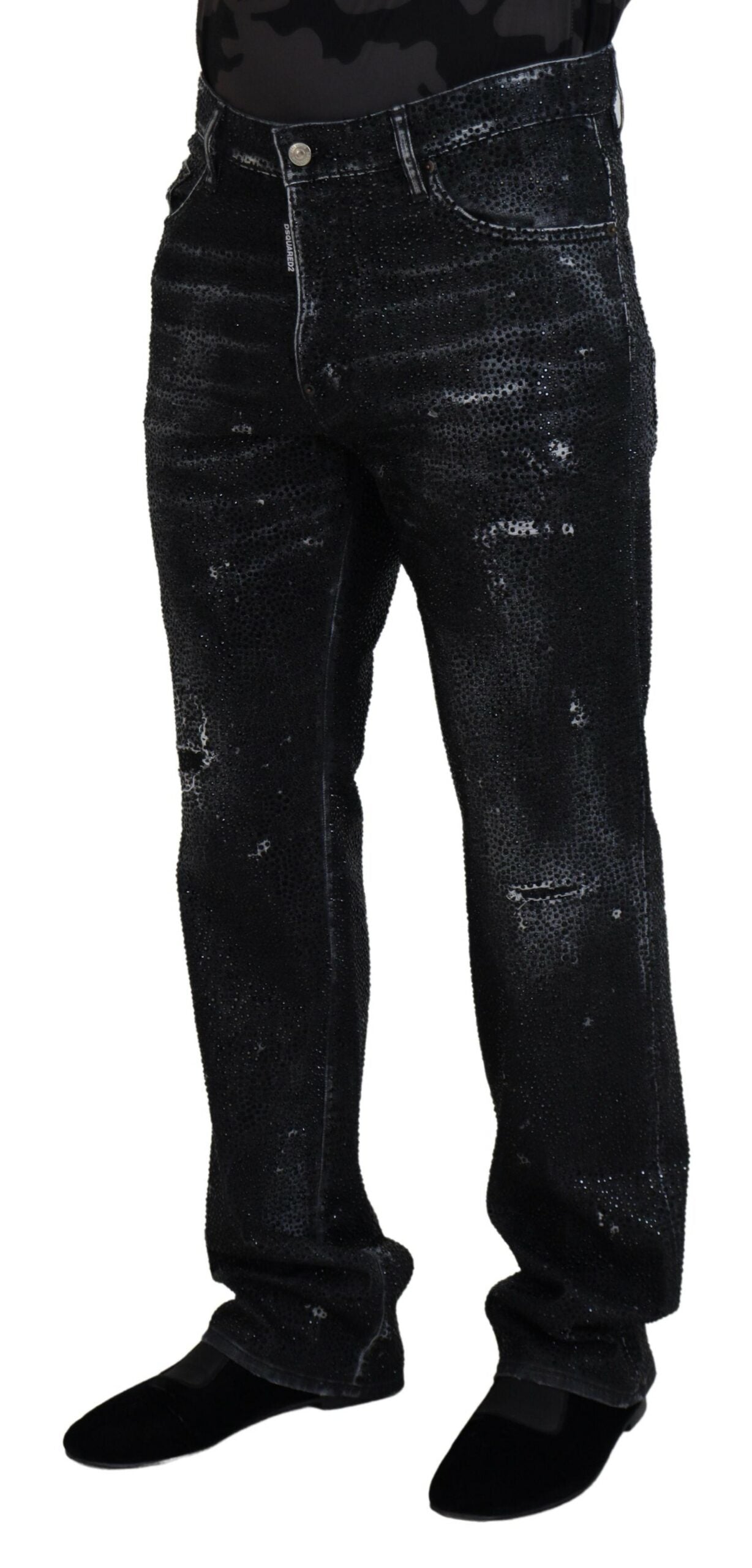Mannequin wearing distressed jeans