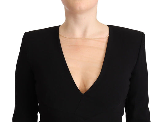 A black long sleeve deep V-neck mini sheath dress with a gold necklace