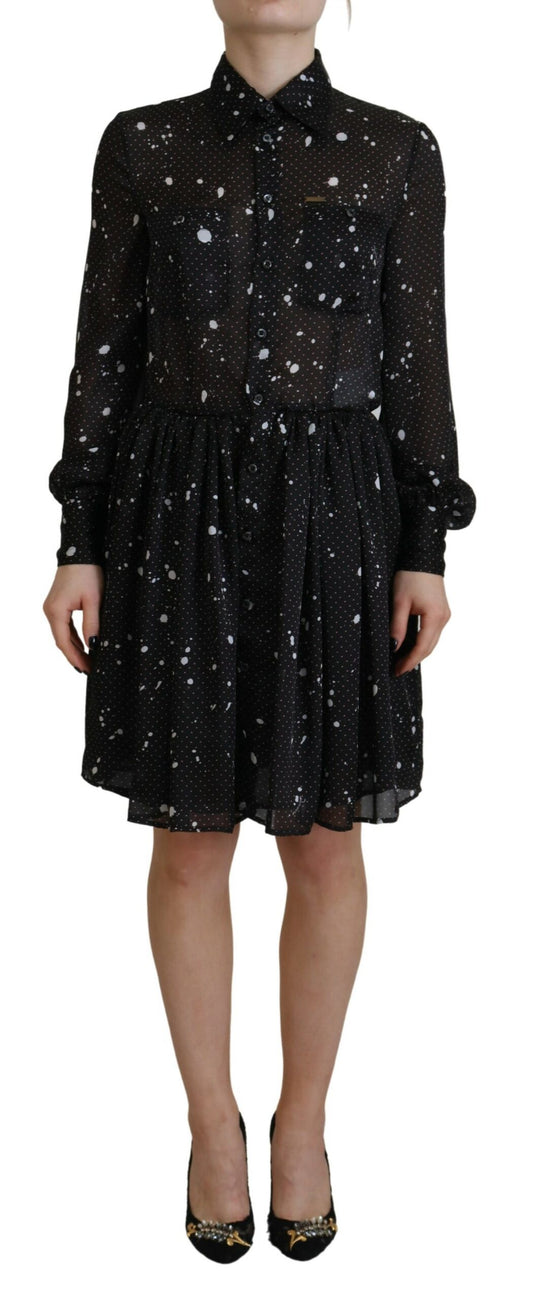 A black dress with polka dots on a white background