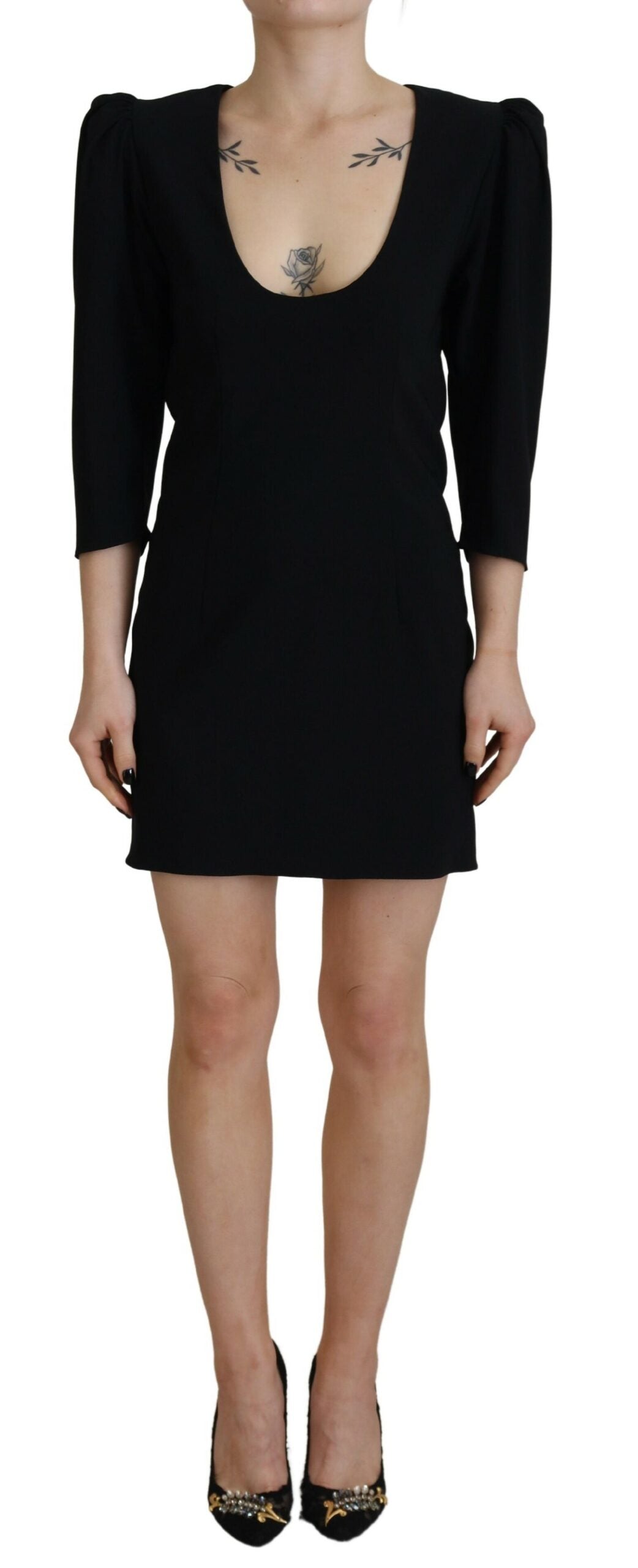 A black polyester bodycon sheath dress with long sleeves
