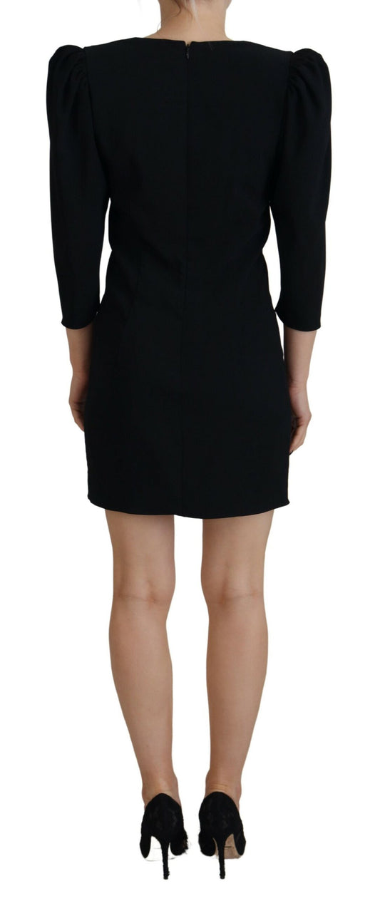 A black polyester long sleeve bodycon sheath dress