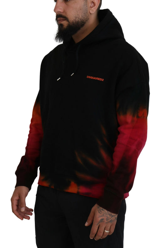 Man wearing black hoodie with red and orange flame design