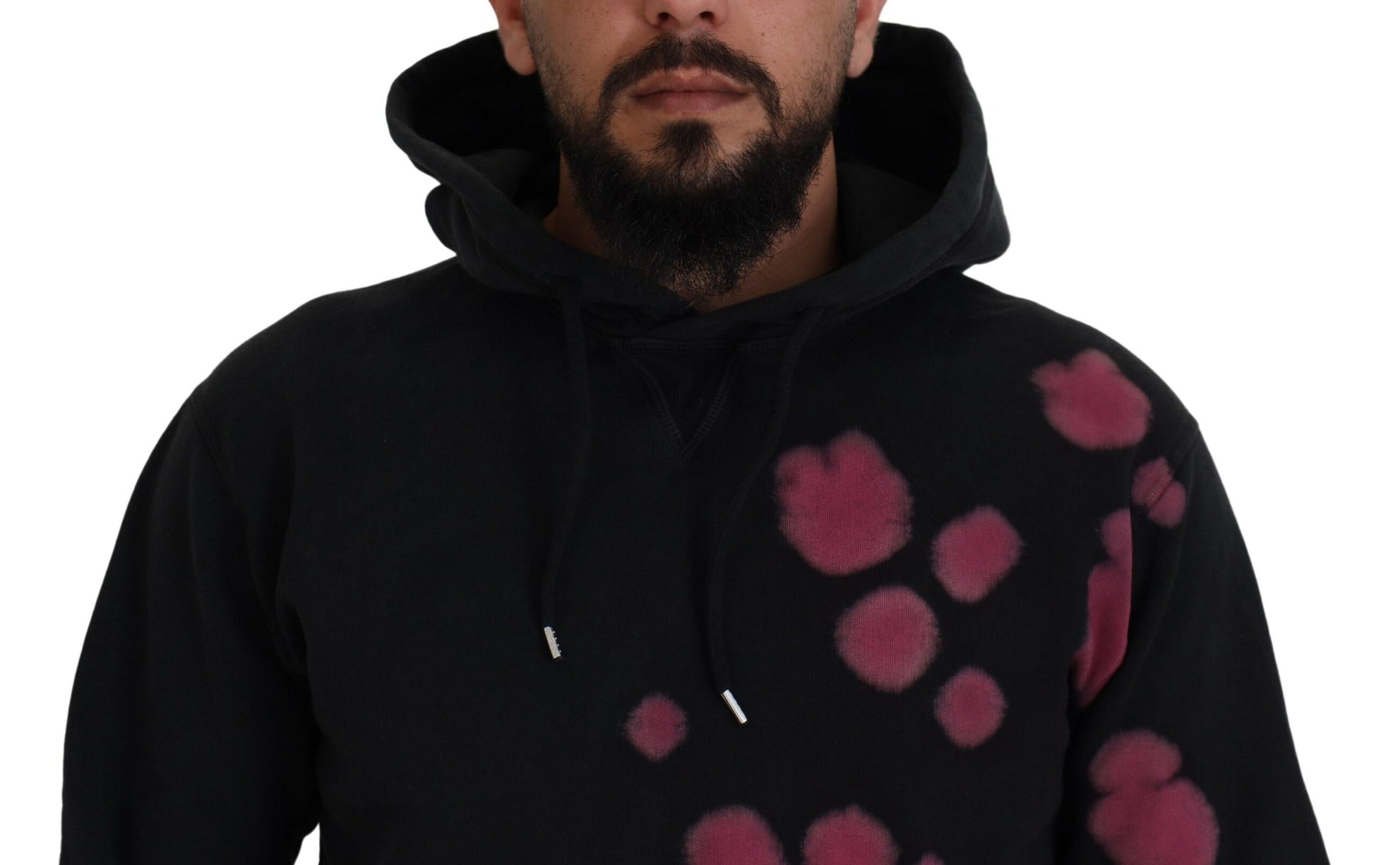 Man wearing black hoodie with pink spots