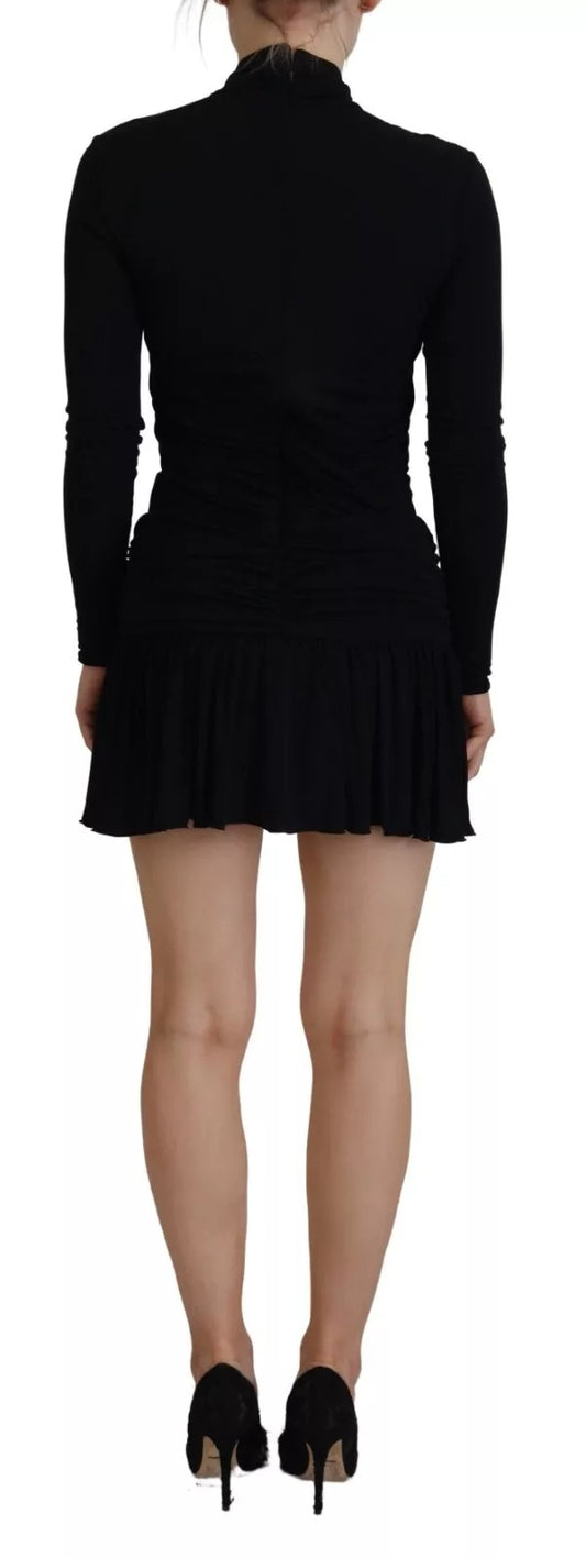 A black viscose long sleeve cut out mini dress with a high neckline