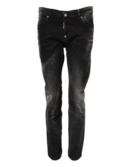Pair of black jeans with distressed design