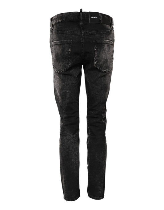 Pair of dark denim jeans with visible stitching details