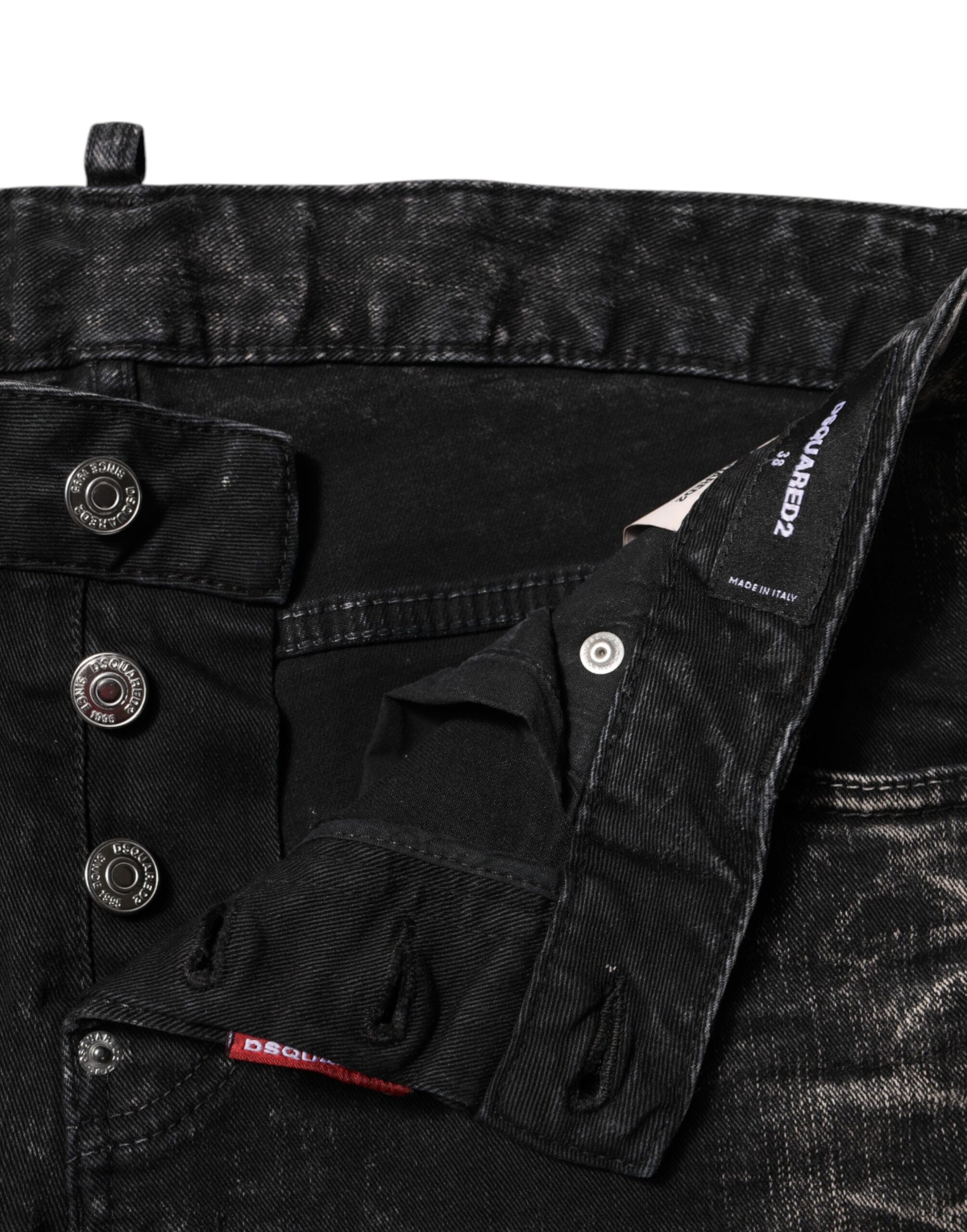 Pair of black jeans with silver buttons
